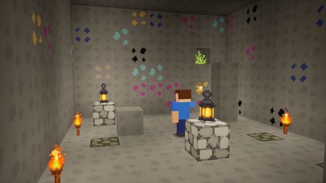 A lantern-lit cave with gems in the walls